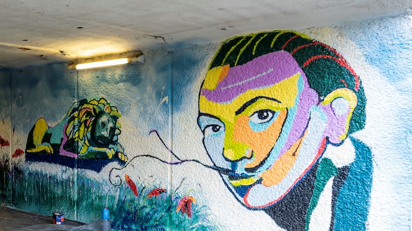 Mural przedstawiający podobiznę Salwadora Dalego i bytomskiego lwa